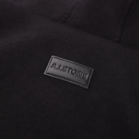 A.I.STONE logo patch on the back of the HALO Hoodie, below the hood